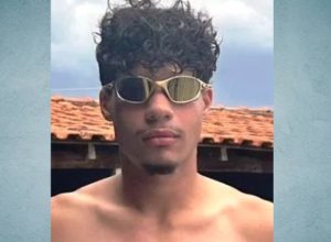 Abstract Grunge Decorative Faded Blue Plaster Wall Background. Vignette Rough Texture With Copy Space. Vintage Horizontal Web Banner.